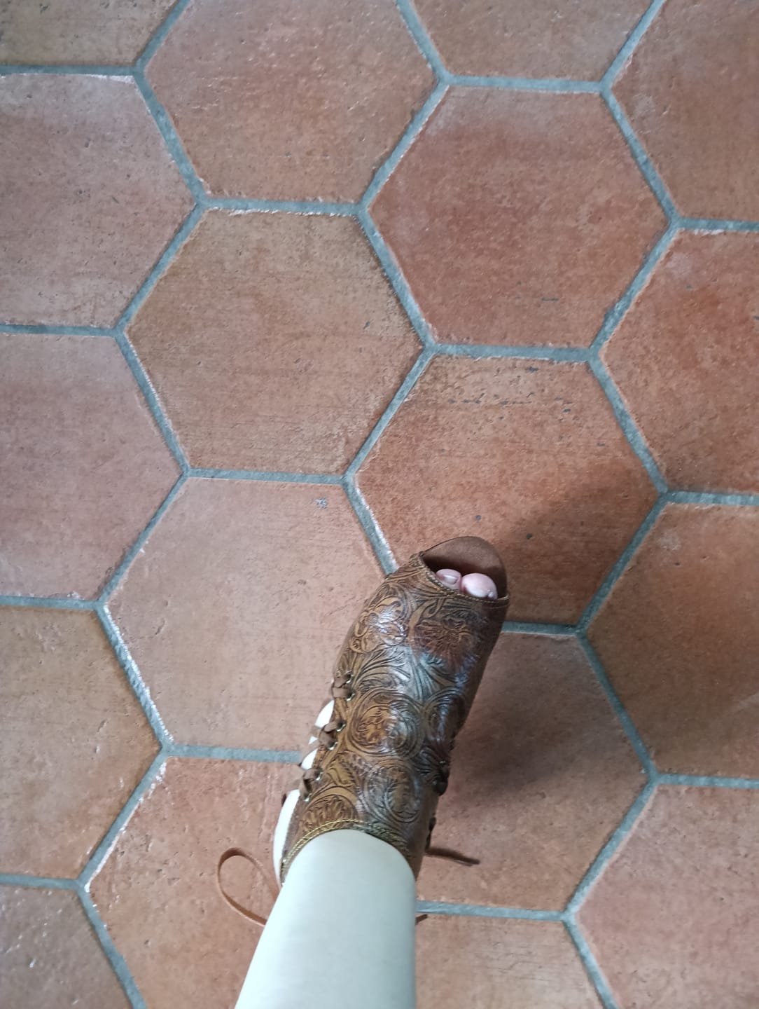 Customer photo review of Vintage Handmade Scroll Carved Sandals