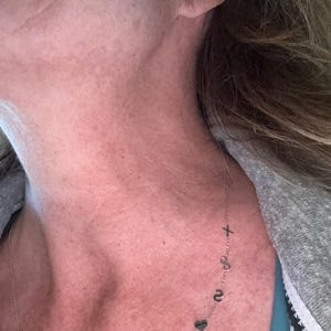 Customer photo review of 14K Solid Gold Sideways Letter Necklace