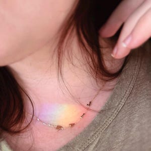 Customer photo review of 14K Solid Gold Sideways Letter Necklace