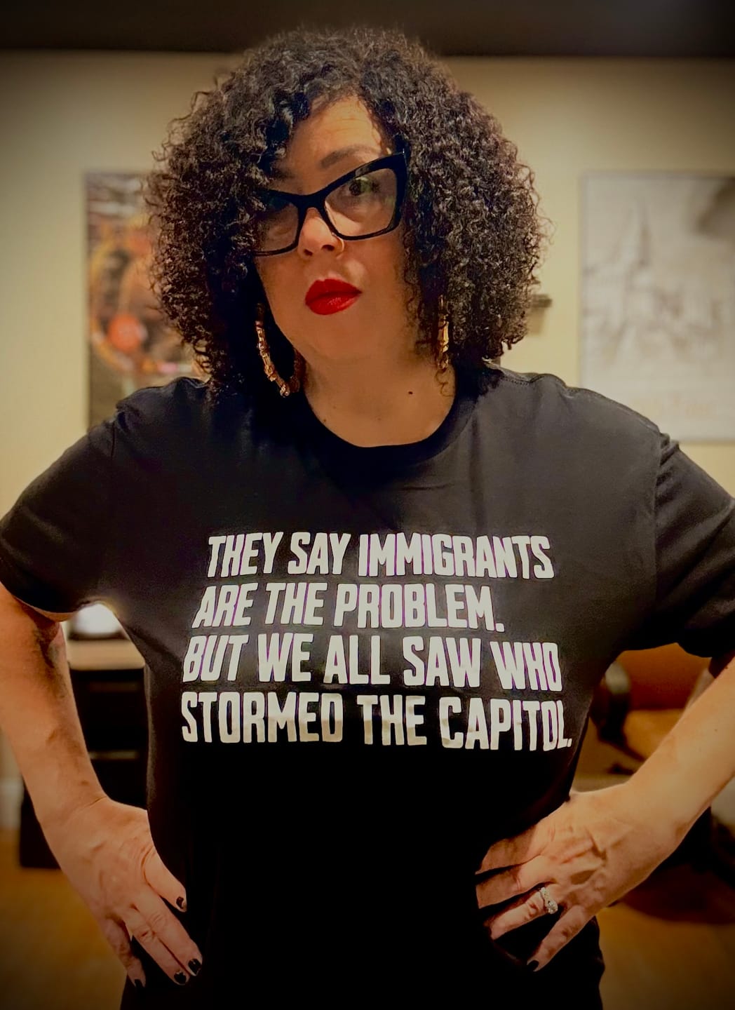 Customer photo review of They Say Immigrants Are the Problem. But We All Saw Who Stormed the Capitol Unisex Tee