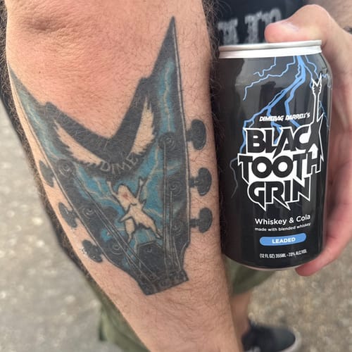Customer photo review of 7 YEAR BLACKTOOTH GRIN LEADED (4pk)