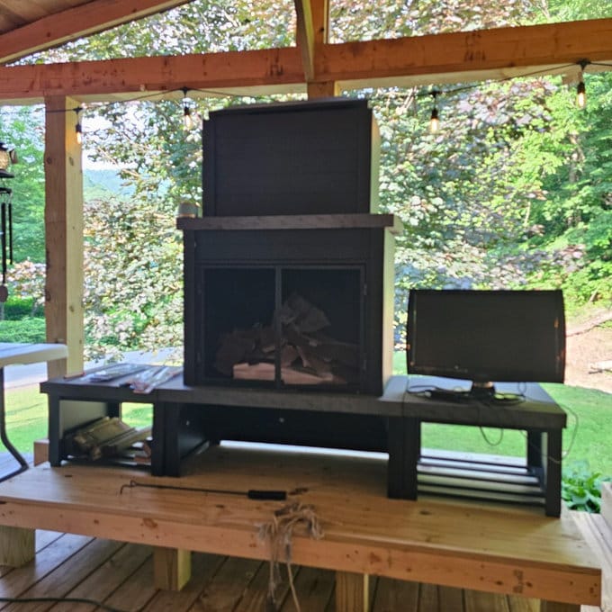 Customer photo review of SUNJOY 58 Inch Modern Wood Burning Fireplace with Chimney & Log Holders