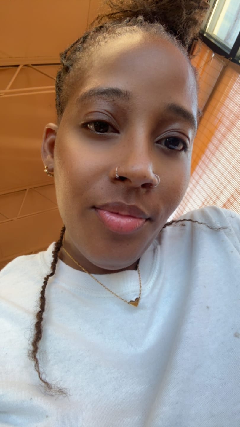 Customer photo review of Minimal Huggie Earrings