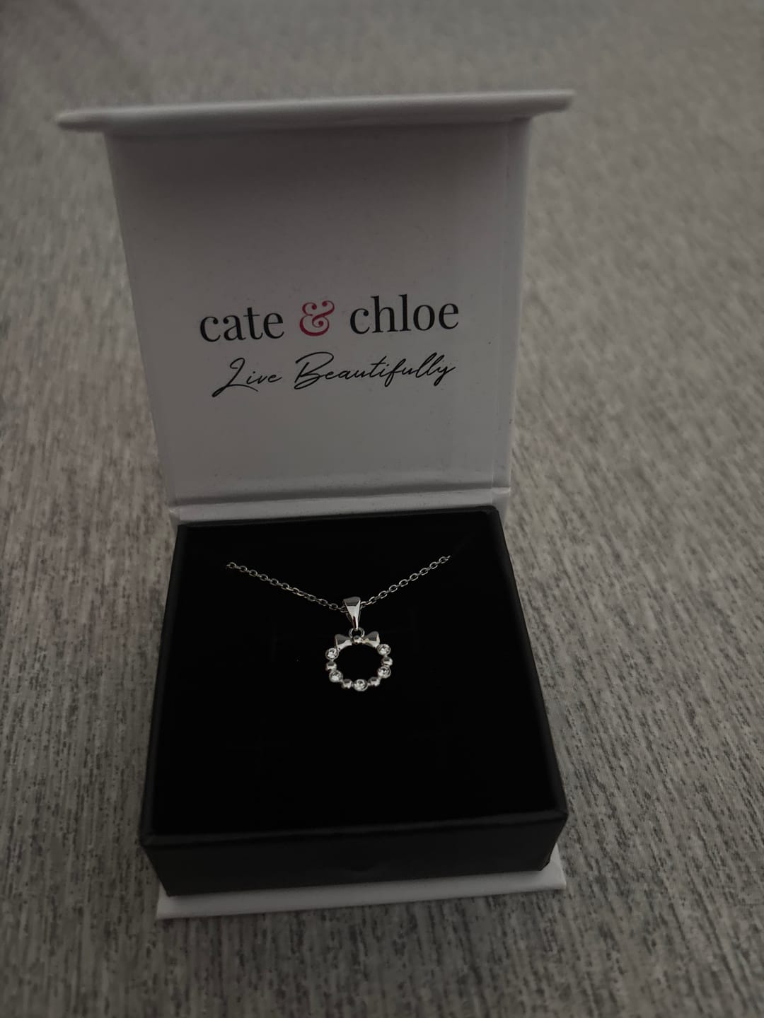 Customer photo review of Edith 18k White Gold Plated Silver Ribbon Necklace with Swarovski Crystals