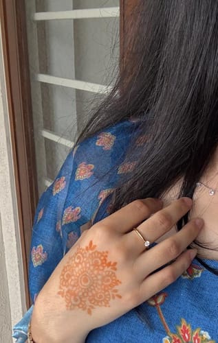 Customer photo review of Mini Solitaire Ring