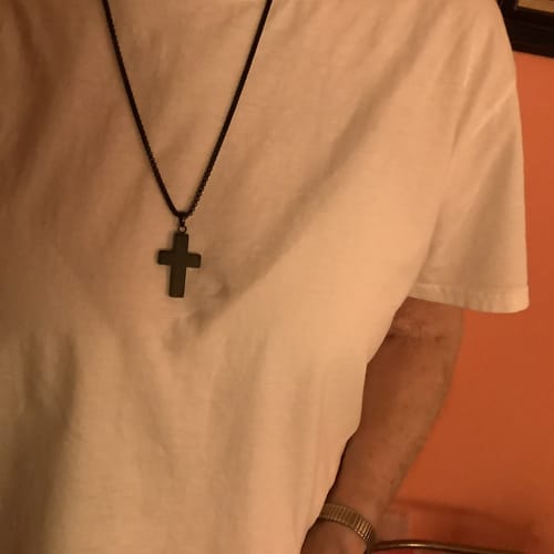 Customer photo review of In God We Trust - American Flag Cross  Necklace: Helps Pair Veterans With A Service Dog Or Shelter Dog
