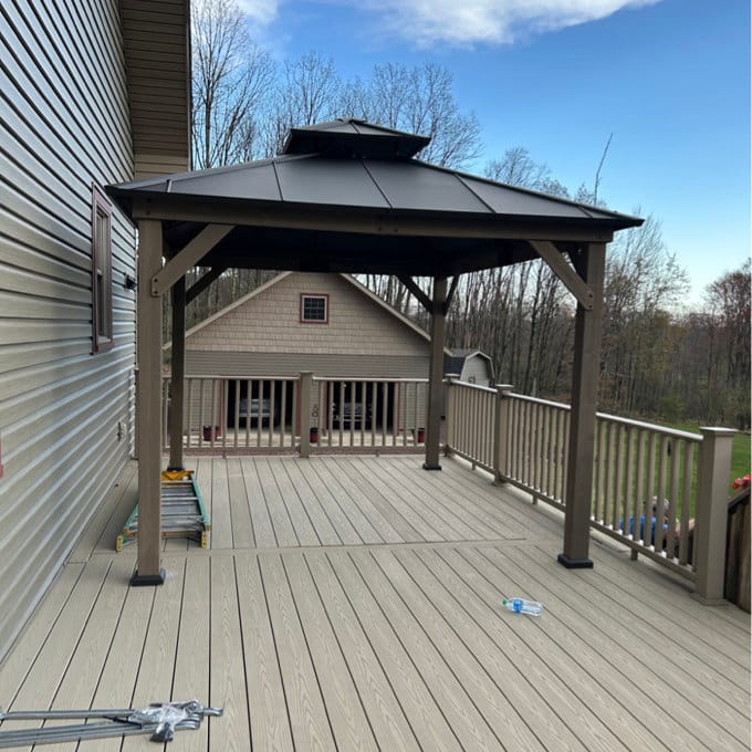 Customer photo review of SUNJOY 10x12 Outdoor Cedar Framed Wooden Gazebo with 2-Tier Metal Roof and Ceiling Hook - Weathered Cedar