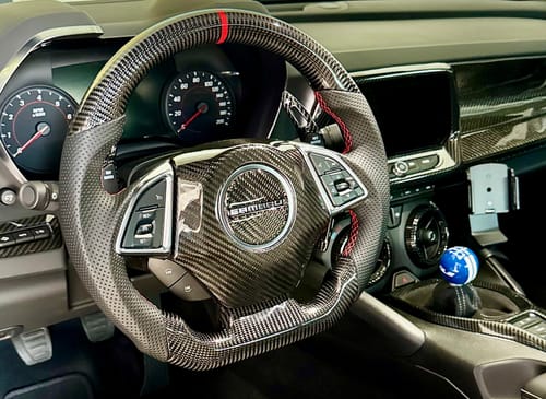 Customer photo review of Real Carbon Fiber Steering Wheel for Chevrolet Camaro 2016-2024 6th Generation D-shaped Flat-Bottom Perforated Leather Grip