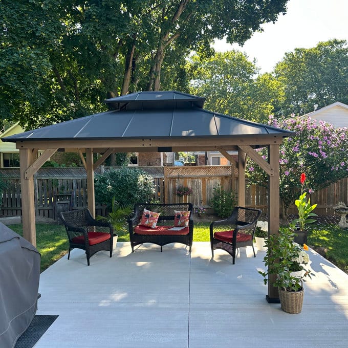 Customer photo review of SUNJOY 10x12 Outdoor Cedar Framed Wooden Gazebo with 2-Tier Metal Roof and Ceiling Hook - Weathered Cedar
