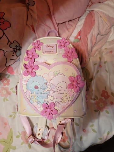 Customer photo review of Loungefly Disney Stitch & Angel Cherry Blossom Heart Mini Backpack