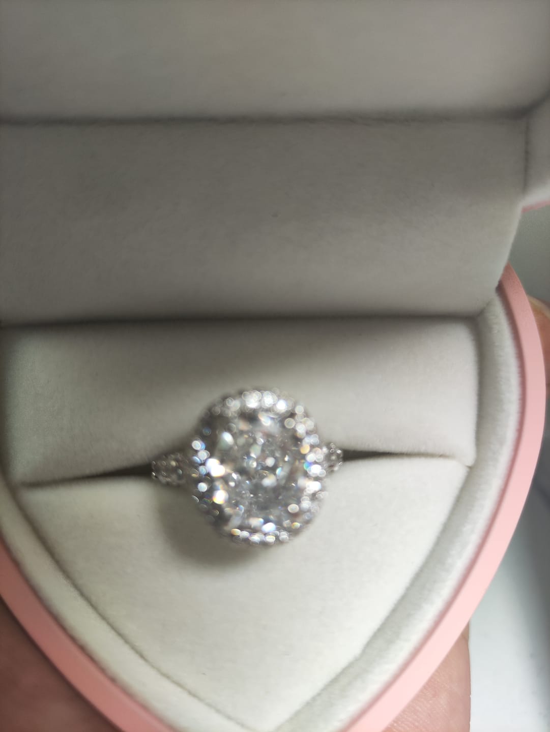 Customer photo review of Gorgeous Hidden Halo Oval Cut 4.0ct Engagement Ring In Sterling Silver