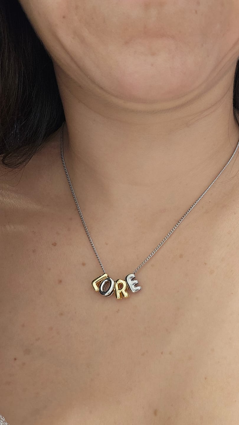 Customer photo review of Personaliza Tu Collar Con Inicial Mini Bubble Combinado
