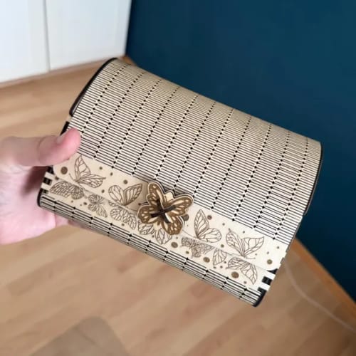 Customer photo review of Wooden butterfly clutch handbag laser cut svg file