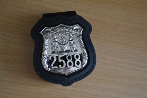 Customer photo review of NYPD Officer Shield Recessed Badge Holder W/ Belt Clip & Neck Chain Top-grain Leather