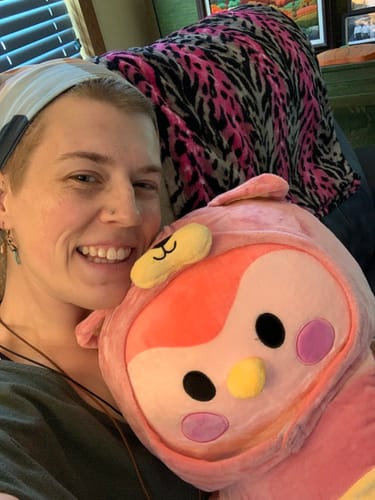 Customer photo review of Pink Finch Plushie – Soft & Cuddly with Pink Bear Costume