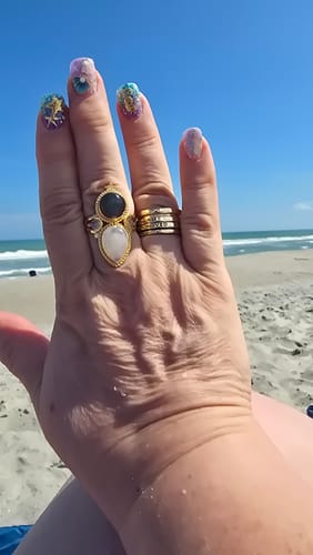 Customer photo review of Fidget Ring with Empowering Engraving Gold Plated