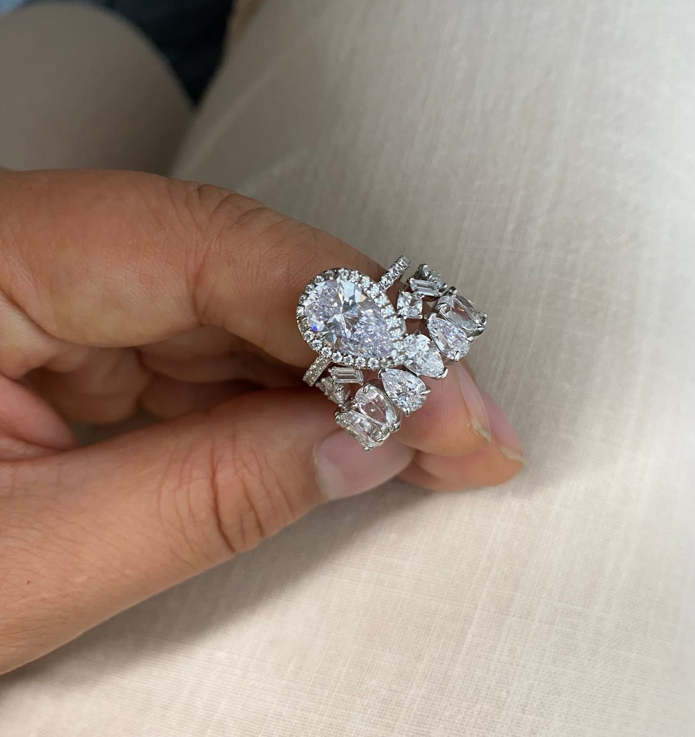 Customer photo review of S925 2.2 Carat Halo Pear Cut Wedding Ring Set With Two Luxurious Wedding Bands For Women