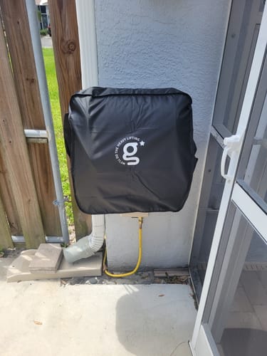 Customer photo review of Grandfalls Retractable Pressure Washer Cover