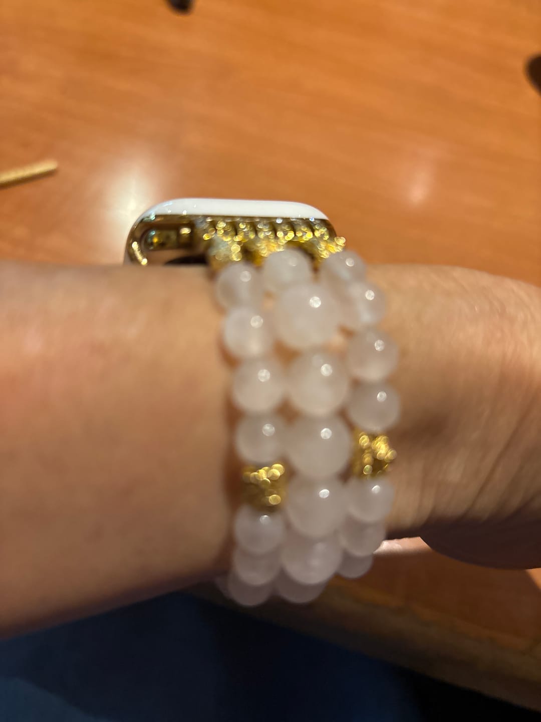 Customer photo review of Rose Quartz Stretch Apple Watch Strap