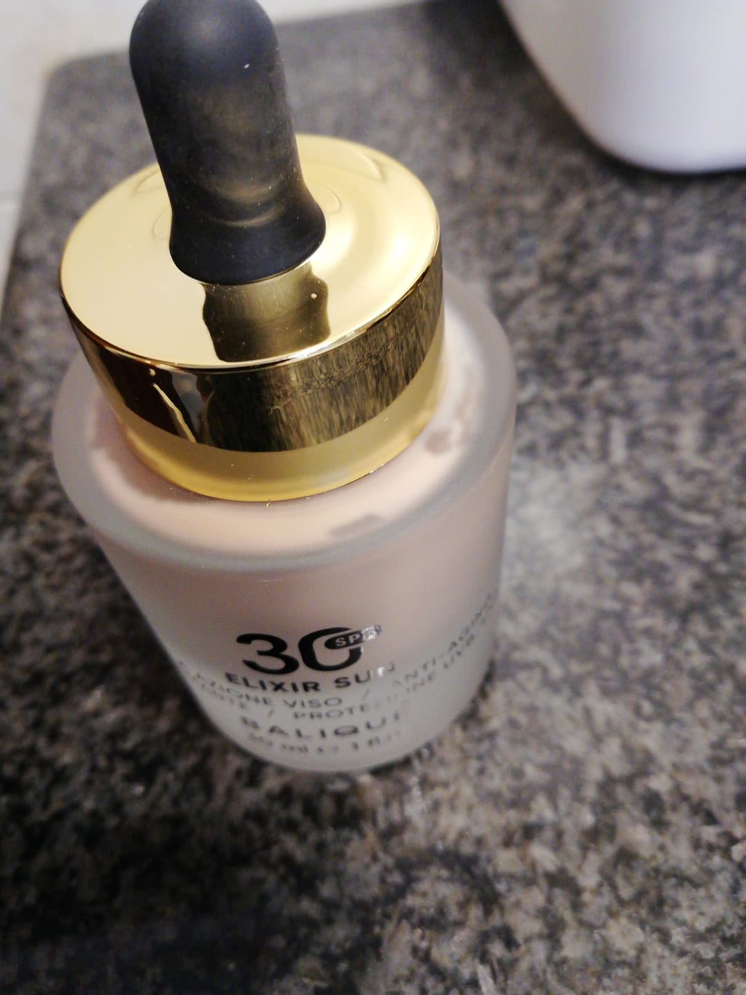 Customer photo review of ELIXIR SUN SPF30 - Siero Viso tripla azione