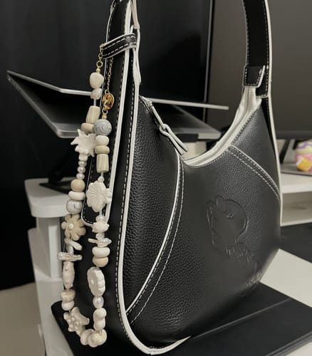 Customer photo review of Island Treasures Clay Charm Necklace