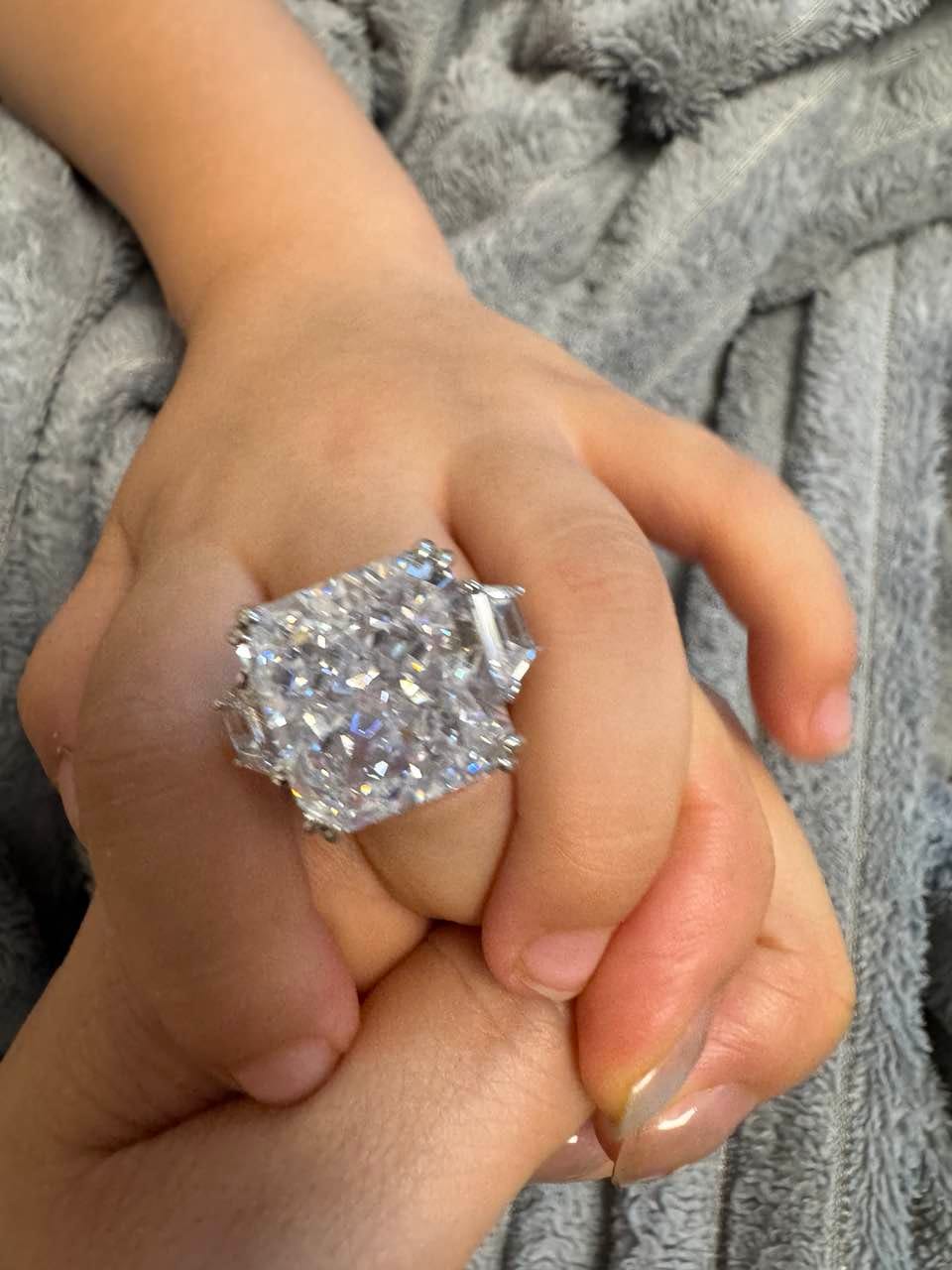 Customer photo review of S925 6.5/12.0 Ct Radiant Cut Crushed Ice Simulated Diamond Three-Stone Engagement Travel Ring