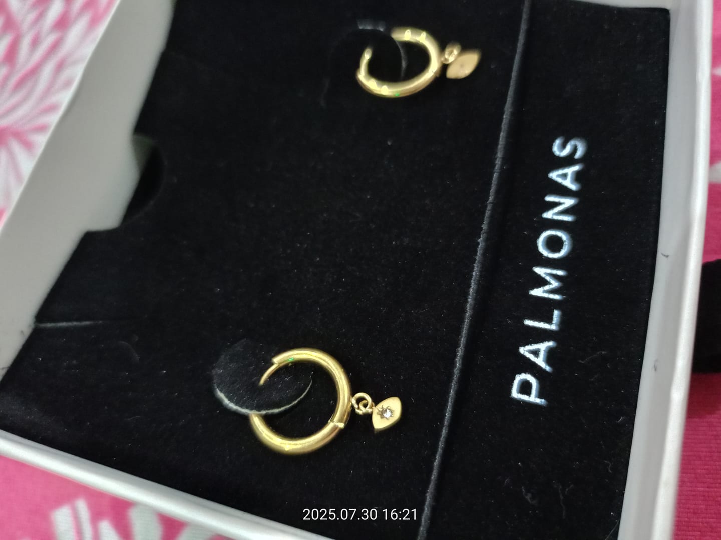 Customer photo review of Tiny Iris Star Hoop Earrings
