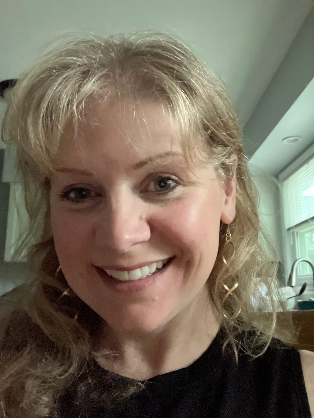 Customer photo review of Infinity Spiral Dangles Hypoallergenic Earrings for Sensitive Ears Made with Plastic Posts