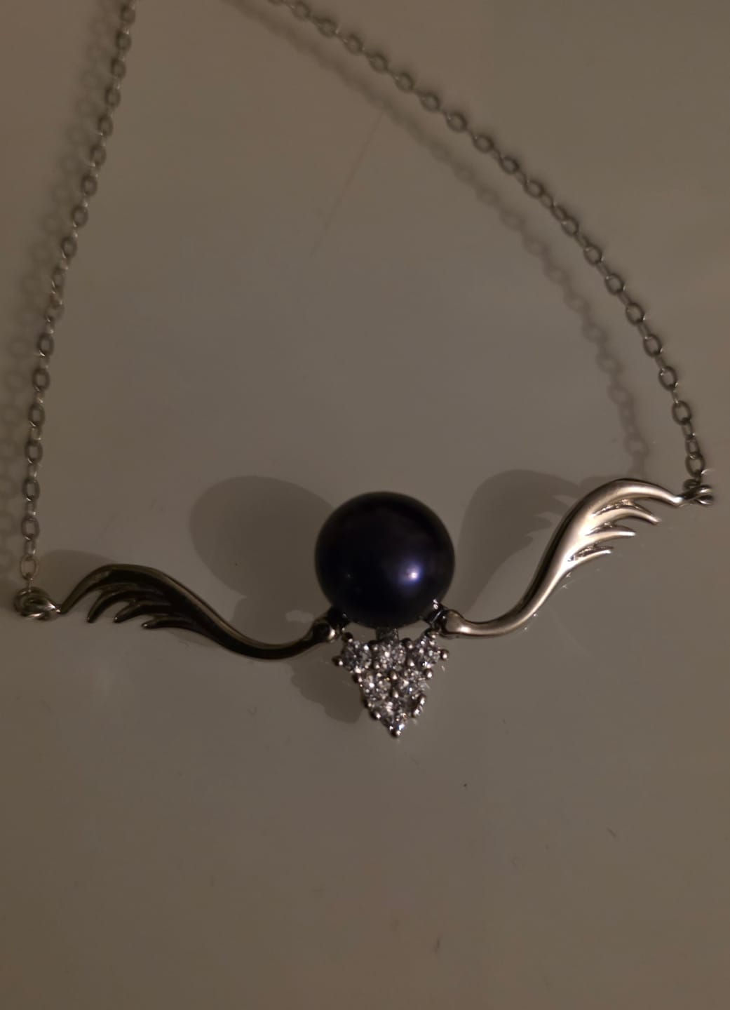 Customer photo review of DIY Mount Pendant - 925 Sterling Silver Clasping Wings with Chain (Big Piece)