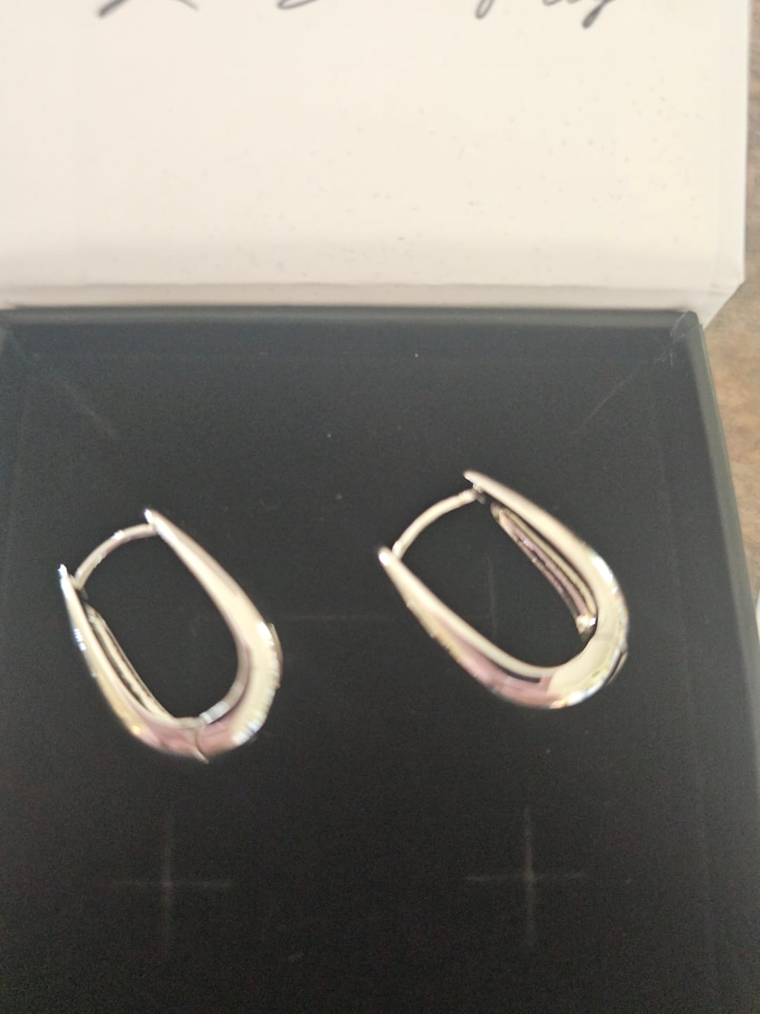 Customer photo review of Salma 18k White Gold Plated 15mm Chunky U-Shaped Hoop Earrings