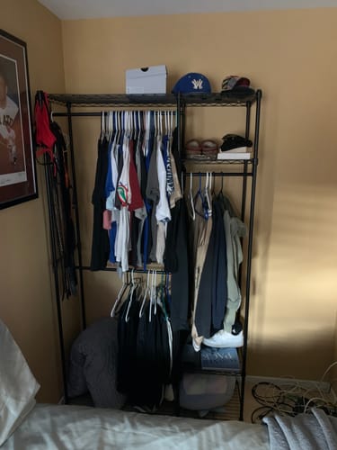 Customer photo review of Raybee Heavy Duty Portable Closet, Wire Garment Rack on wheels, Adjustable Hanging Clothes Rack, For Bedroom