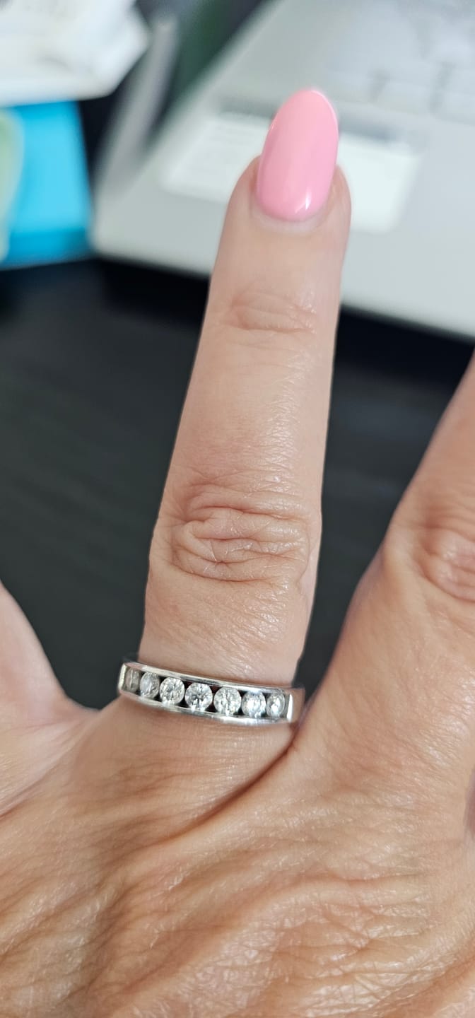 Customer photo review of Channel Set Moissanite Half Eternity Wedding Band Ring In Sterling Silver