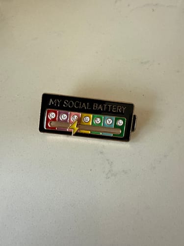 Customer photo review of Mood Tracker Enamel Pin