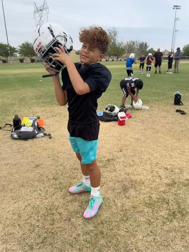 Customer photo review of Kool-Aid 'Sharkleberry Fin' Football Cleats - Quantum Speed by Phenom Elite