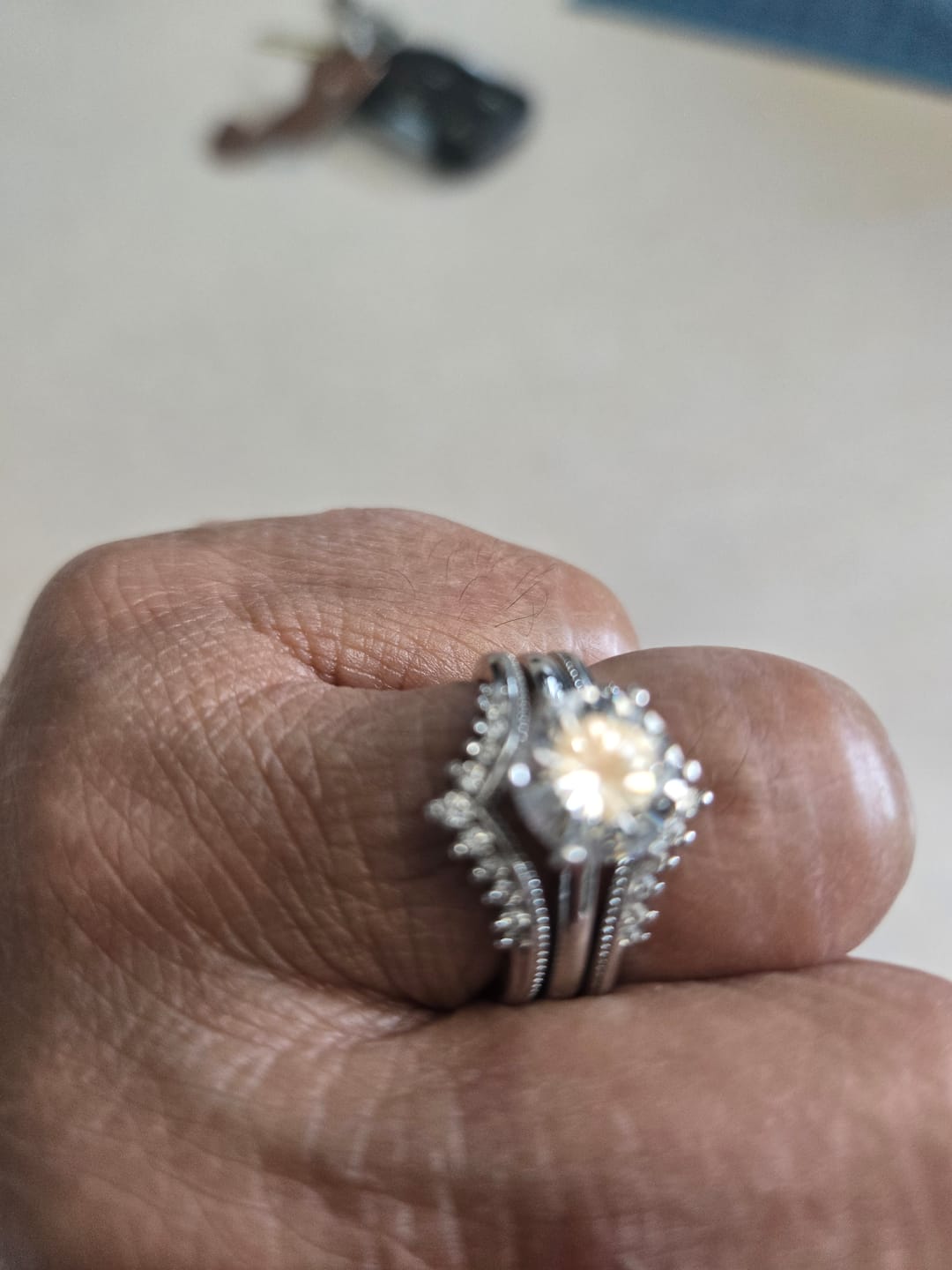 Customer photo review of Solitaire Moissanite With Enhancer Shank Bridal Engagement Ring Set
