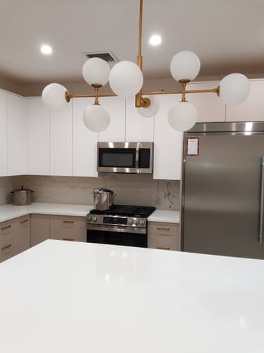 Customer photo review of 8-Light Linear Sputnik Frosted Glass Globe Chandelier