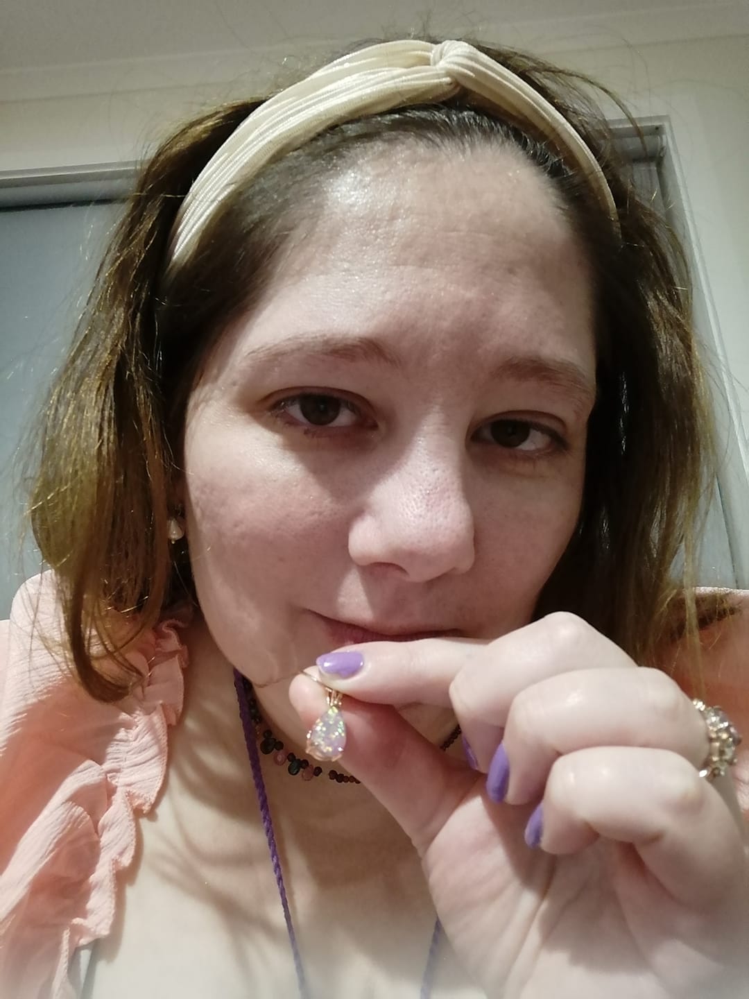 Customer photo review of Olivenorma Minimalist Droplet Opal Pendant Necklace