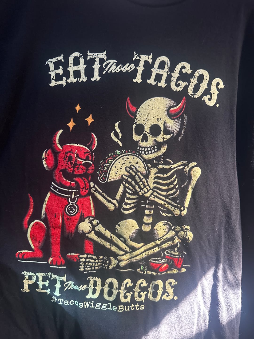 Customer photo review of Eat Those Tacos Pet Those Doggos T-Shirt