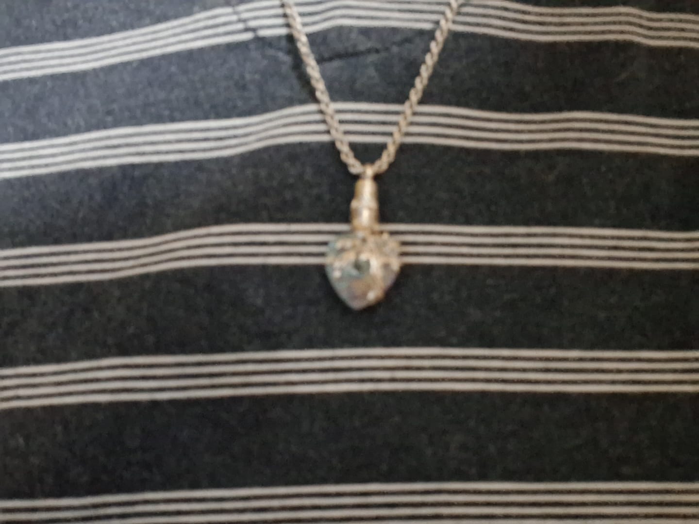 Customer photo review of Crystal Cremation Necklace - Tree of Life Keepsake Urn