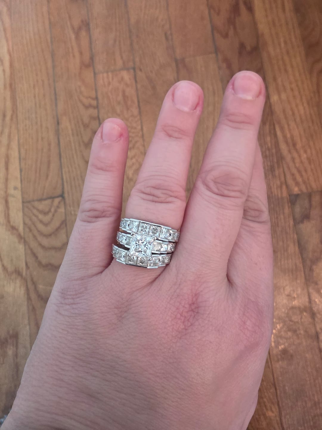 Customer photo review of Princess Moissanite Staircase Channel Set Half Eternity Wedding Band
