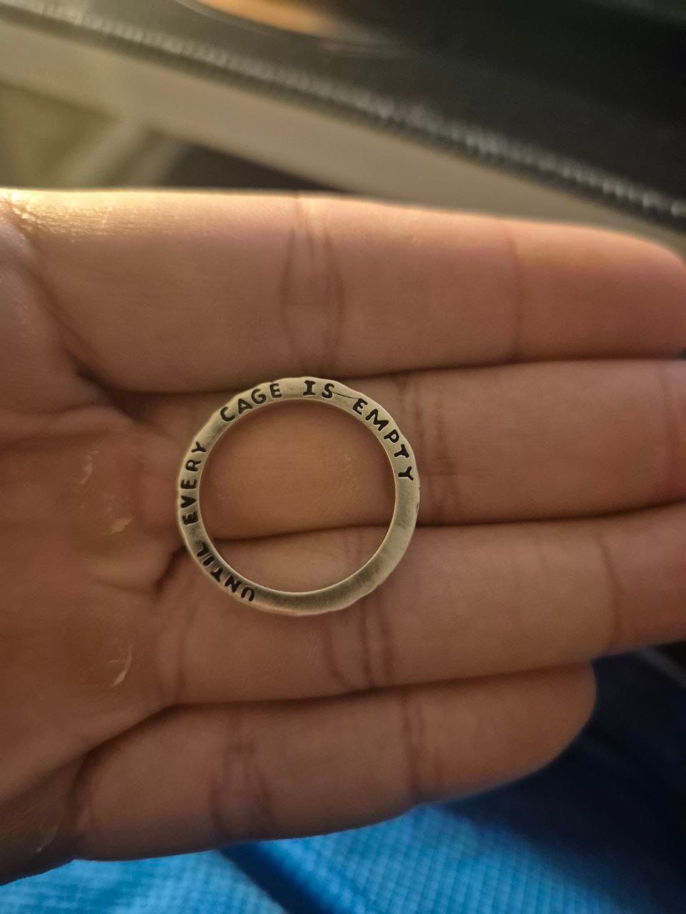 Customer photo review of Until Every Cage is Empty | Silver Ring