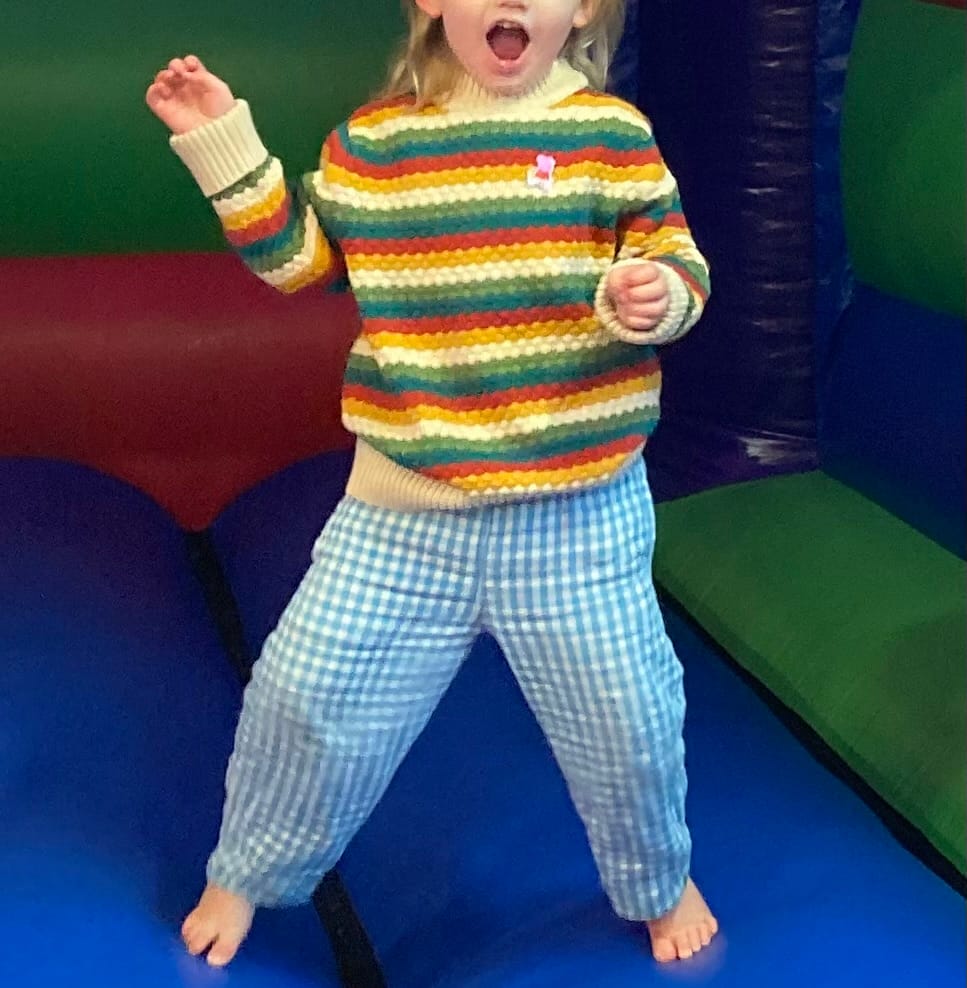 Customer photo review of From One To Another Honeycomb Rainbow Striped Snuggly Knitted Jumper
