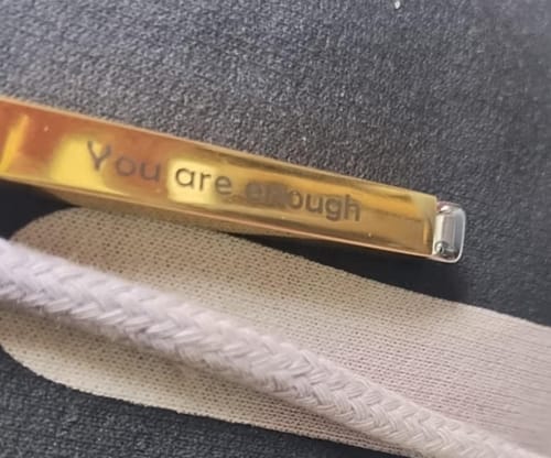 Customer photo review of Custom Text Engraved Secret Message Necklace