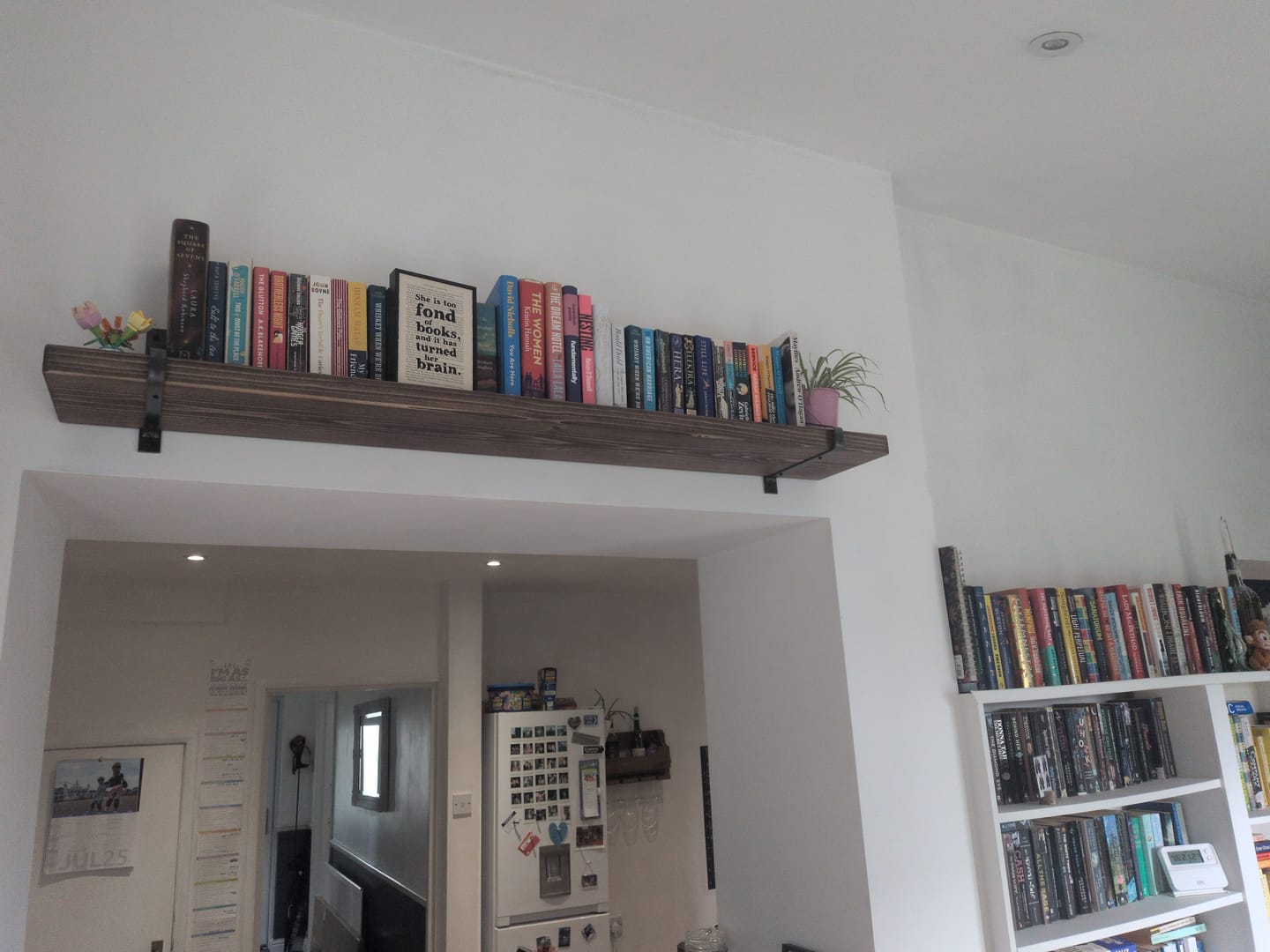 Customer photo review of Rustic Wooden Wall Shelves with Triangle Metal Wall Brackets