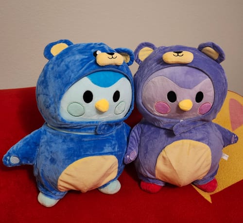 Customer photo review of Blue Finch Plushie – Soft & Cuddly with Blue Bear Costume