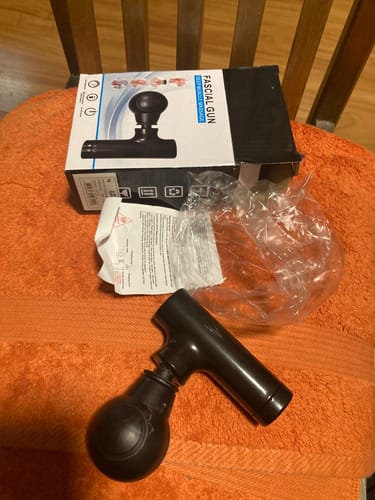 Customer photo review of Masajeador Pistola Fascia Muscular Mini