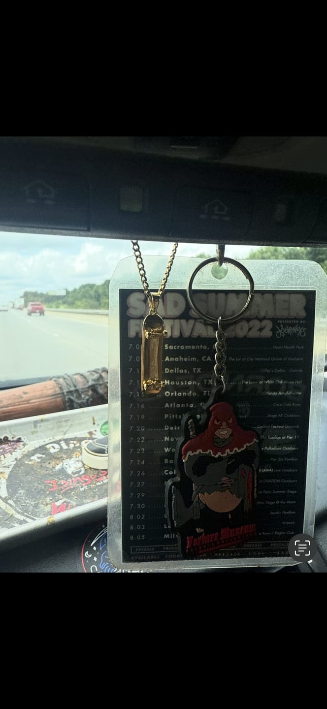 Customer photo review of Personalized Skateboard Pendant (Gold)