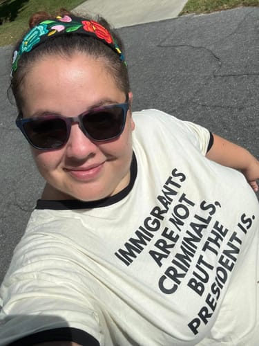 Customer photo review of Immigrants Premium Unisex T-Shirt