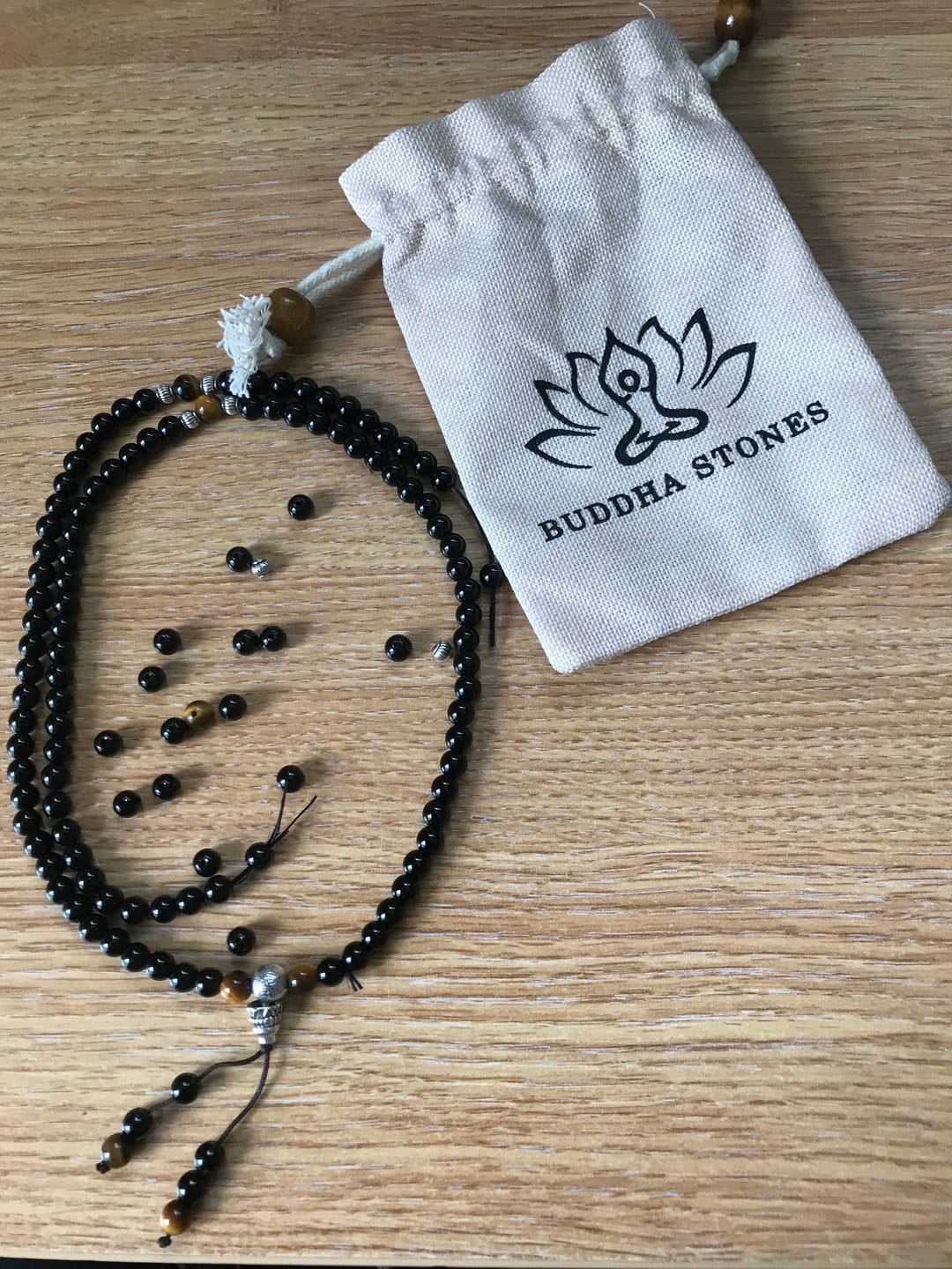 Customer photo review of Buddha Stones Black Obsidian Tiger Eye Blessing Mala Bracelet
