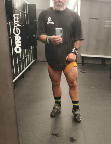 Customer photo review of SQUATTING SHORTS – RETRO / AMBER ORANGE